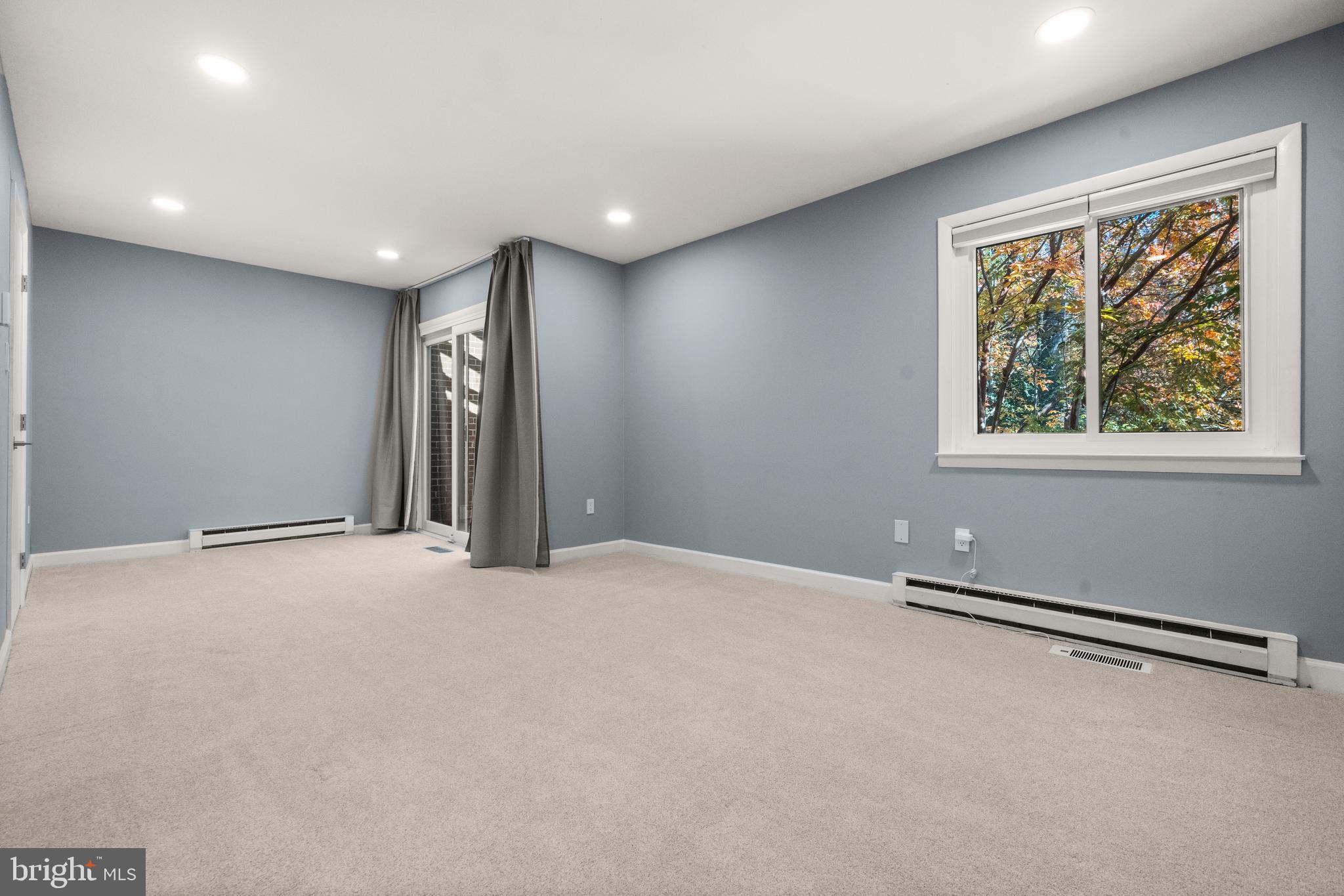 2152 Glencourse Lane Reston, VA 20191 - Photo 17 of 52 a view of an empty room with a window