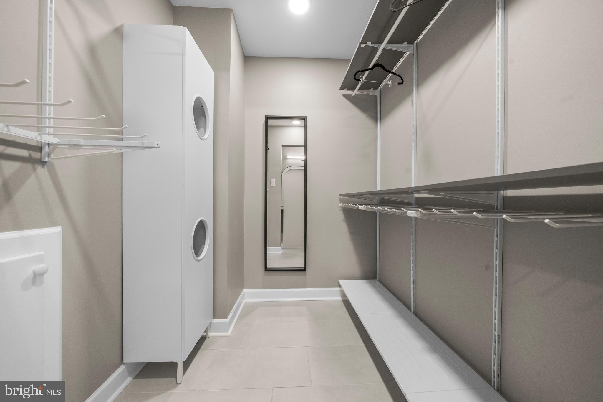 2152 Glencourse Lane Reston, VA 20191 - Photo 23 of 52 a view of a hallway with wooden floor and staircase