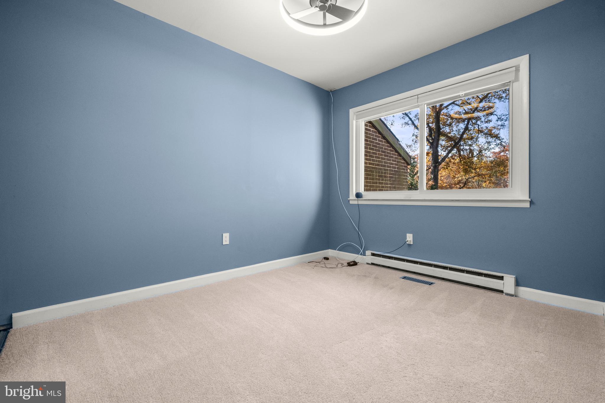 2152 Glencourse Lane Reston, VA 20191 - Photo 26 of 52 a view of an empty room with a window