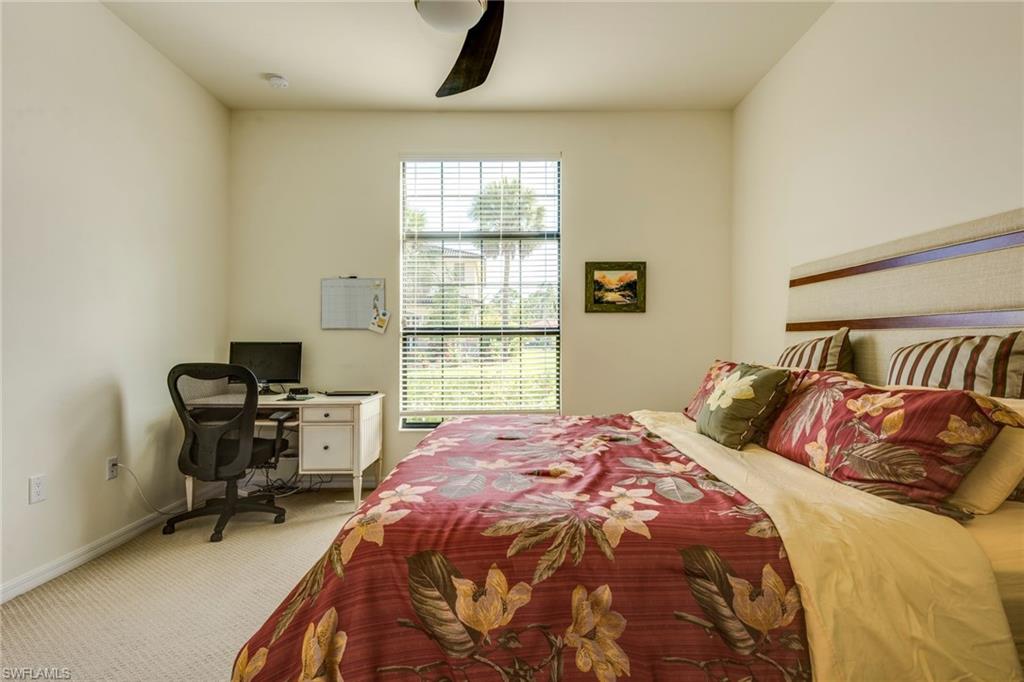 1308 Kendari Terrace Naples, FL 34113 - Photo 15 of 21 Carpeted bedroom with an office area and ceiling fan