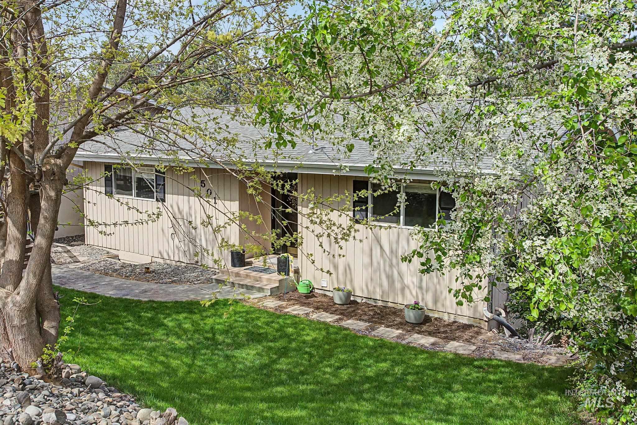 501 Karin Avenue Lewiston, ID 83501 - Photo 2 of 50 Rear view of house with a lawn and roof with shingles