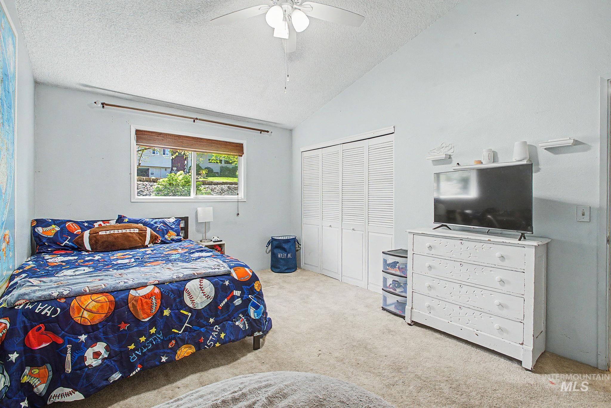 501 Karin Avenue Lewiston, ID 83501 - Photo 28 of 50 Carpeted bedroom with a closet and ceiling fan