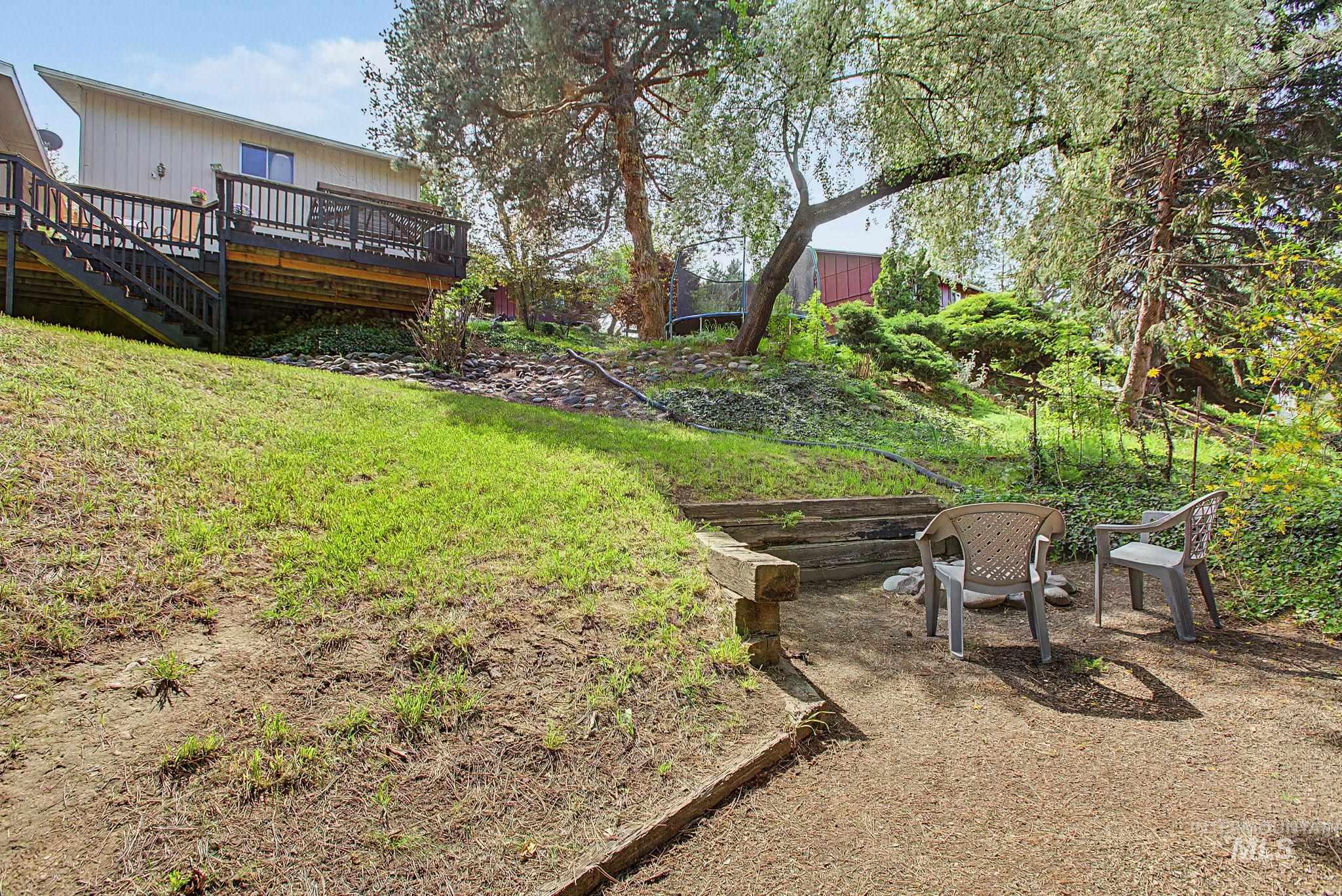 501 Karin Avenue Lewiston, ID 83501 - Photo 40 of 50 View of grassy yard with a deck