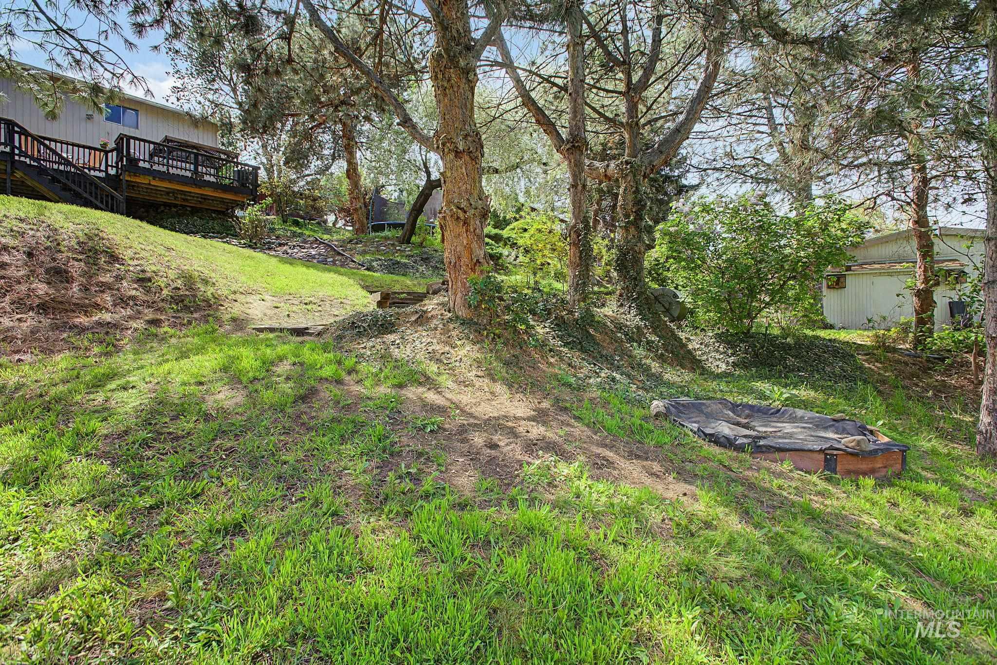 501 Karin Avenue Lewiston, ID 83501 - Photo 41 of 50 View of yard featuring a wooden deck