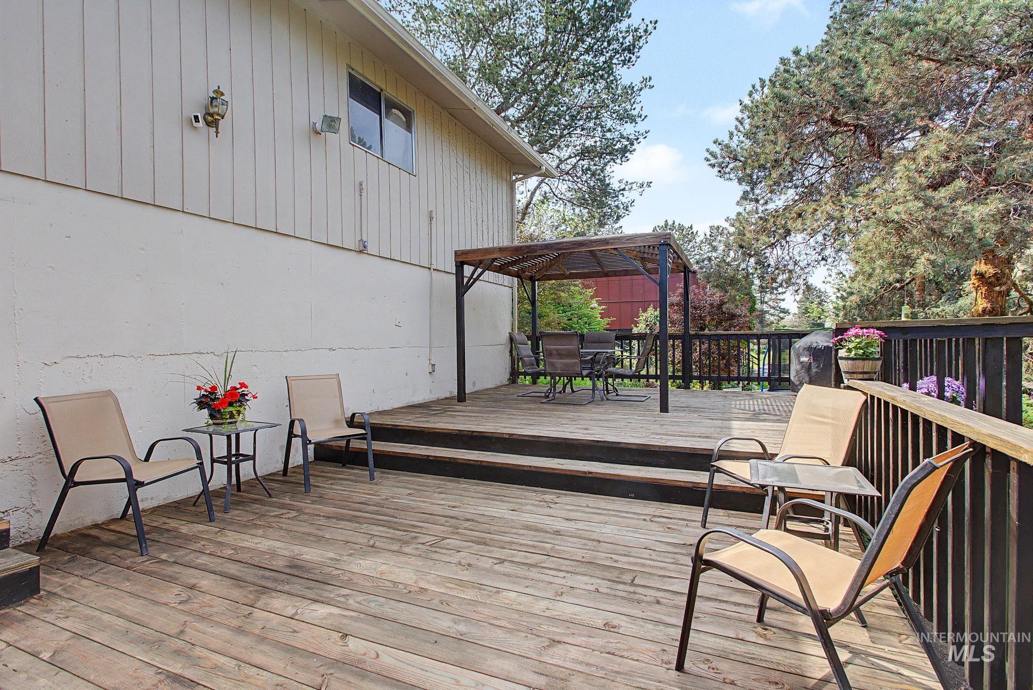501 Karin Avenue Lewiston, ID 83501 - Photo 6 of 50 Wooden terrace with outdoor dining space and a gazebo