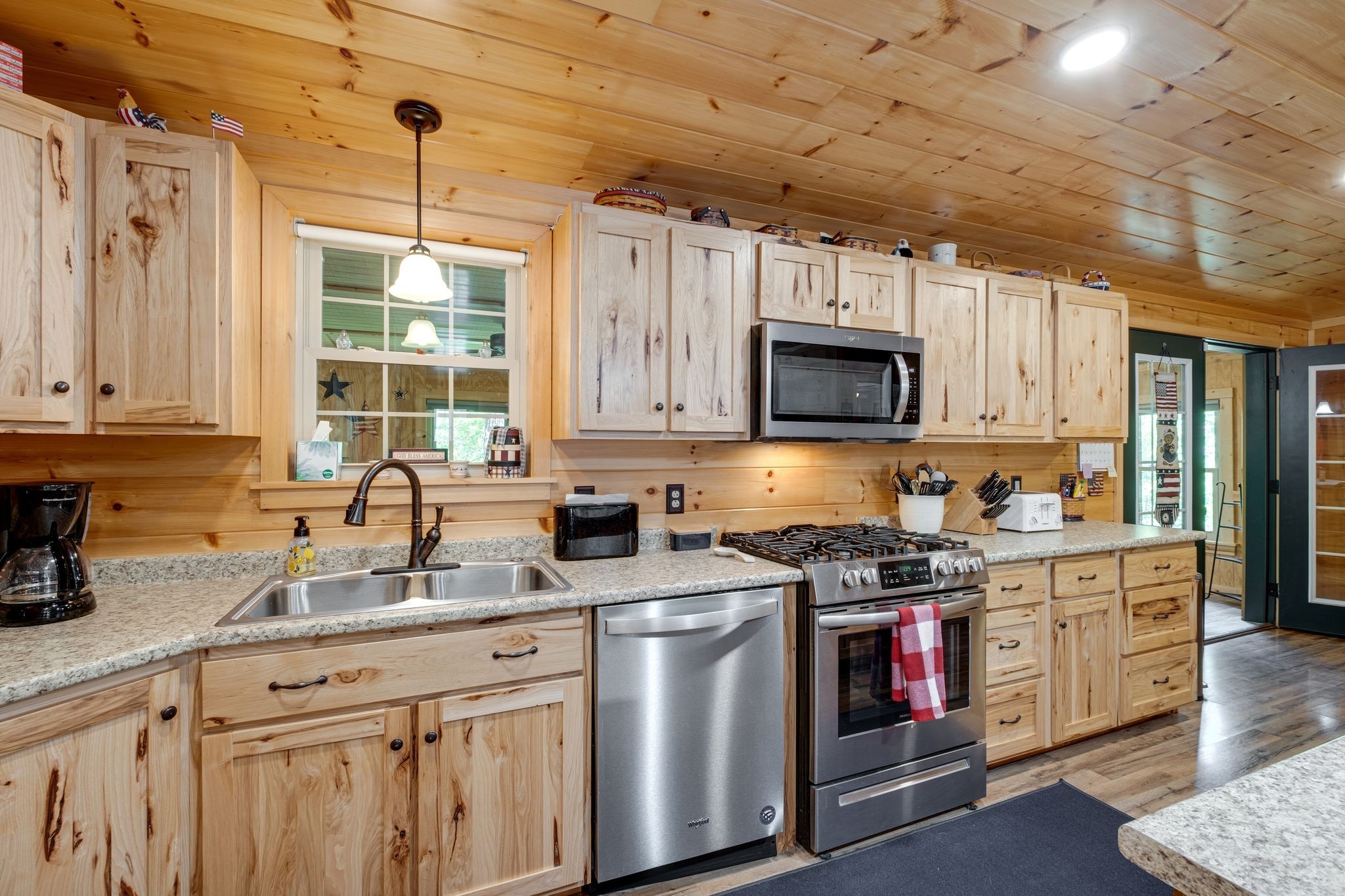 2614 Distillery Road Greenbrier, TN 37073 - Photo 11 of 34 a kitchen with granite countertop a stove sink and cabinets