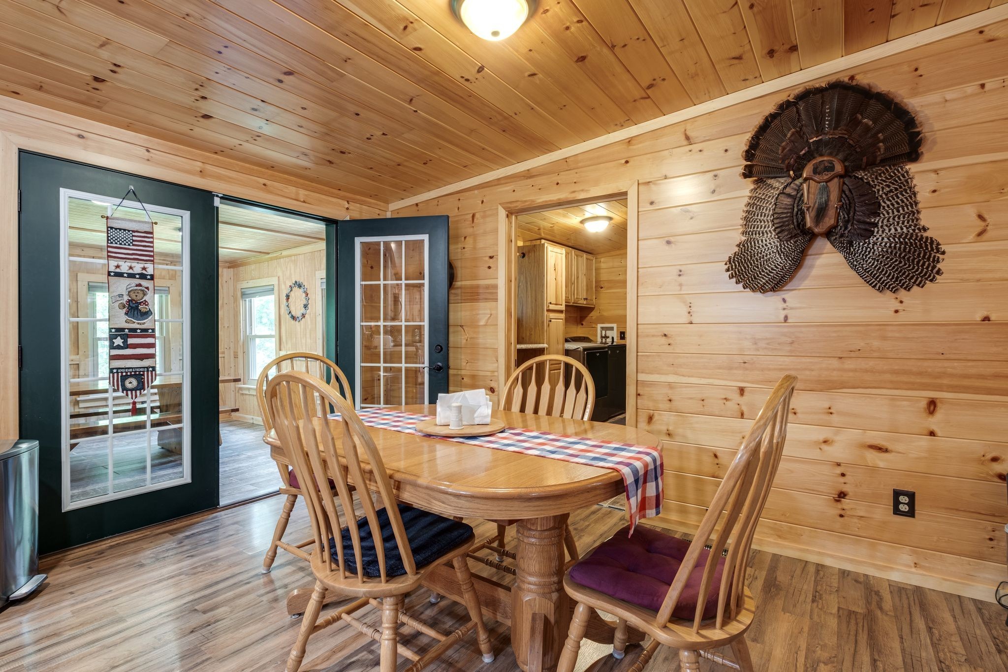 2614 Distillery Road Greenbrier, TN 37073 - Photo 13 of 34 a view of a dining room with furniture and wooden floor