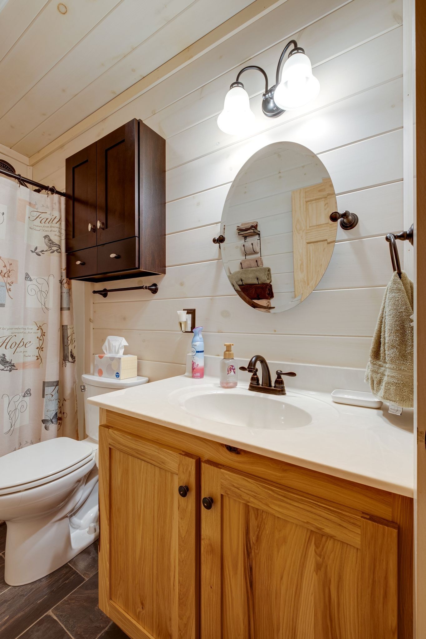 2614 Distillery Road Greenbrier, TN 37073 - Photo 23 of 34 a bathroom with a sink a toilet and a mirror
