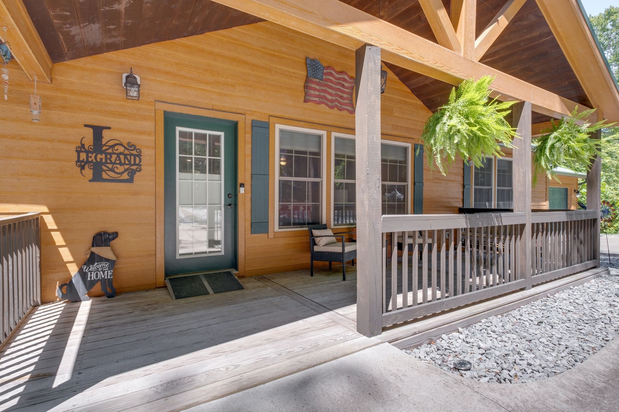 2614 Distillery Road Greenbrier, TN 37073 - Photo 3 of 34 a porch with a bench next to a yard