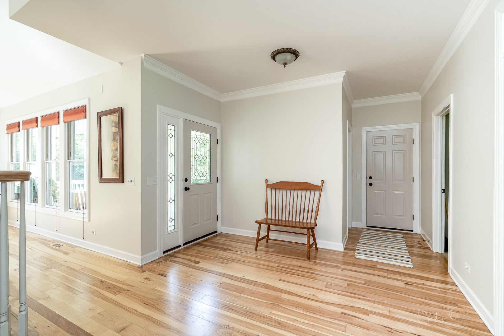 10314 Oak Ridge Road Marengo, IL 60152 - Photo 3 of 30 a view of a room with wooden floor and stairs