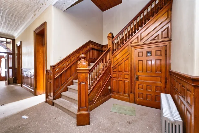 a view of entryway with stairs