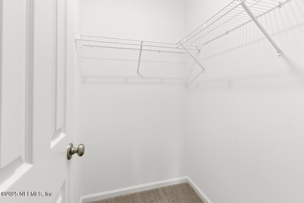 7845 Pipit Avenue Jacksonville, FL 32219 - Photo 30 of 38 a view of small space with racks on the wall