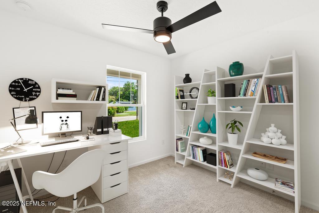 7845 Pipit Avenue Jacksonville, FL 32219 - Photo 31 of 38 a room with furniture a clock and a window