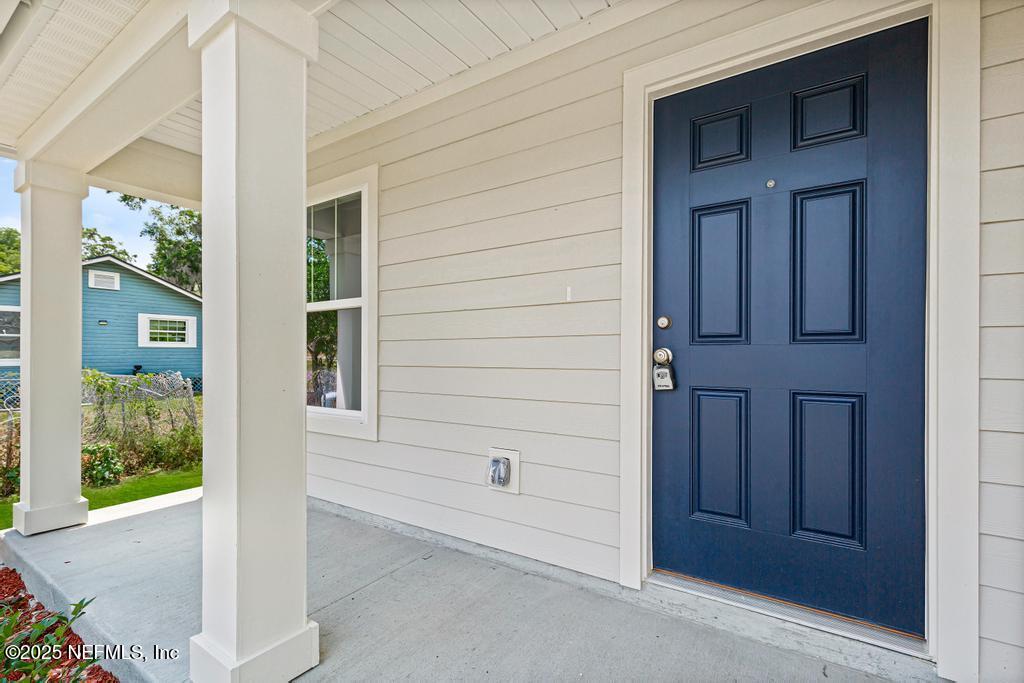 7845 Pipit Avenue Jacksonville, FL 32219 - Photo 6 of 38 a view of front door of a house