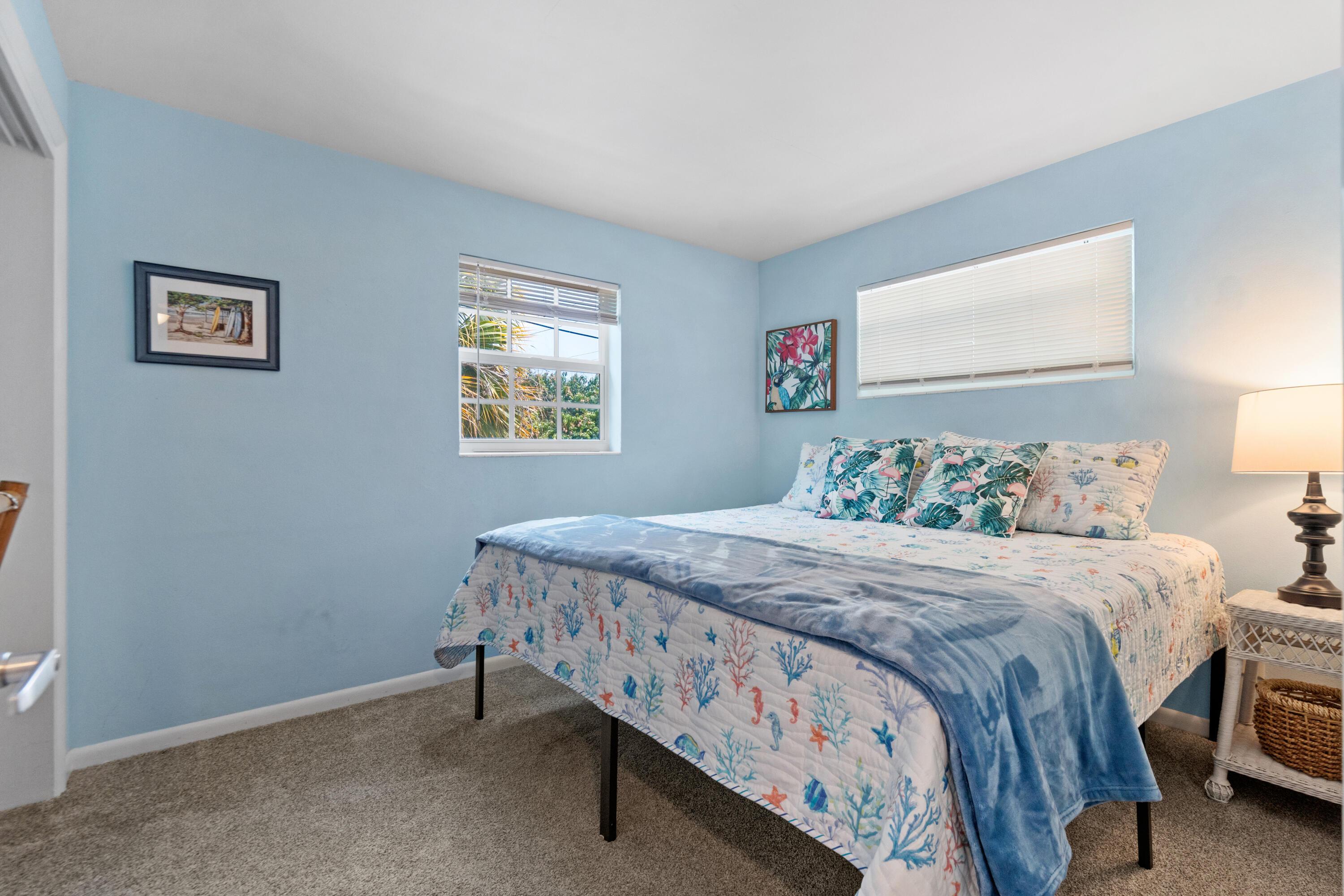 249 Center Street, Unit 2C Jupiter, FL 33458 - Photo 21 of 29 a bedroom with a bed and a window