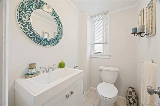 a bathroom with a toilet and a sink