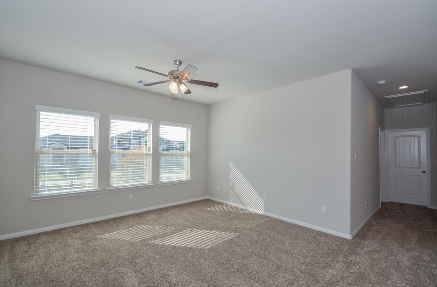 3306 Rainflower Springs Lane Rosenberg, TX 77471 - Photo 11 of 18 a view of an empty room with a window