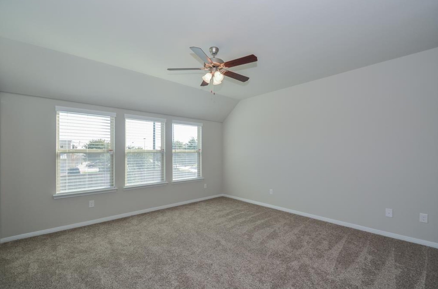 3306 Rainflower Springs Lane Rosenberg, TX 77471 - Photo 12 of 18 a view of an empty room with a window