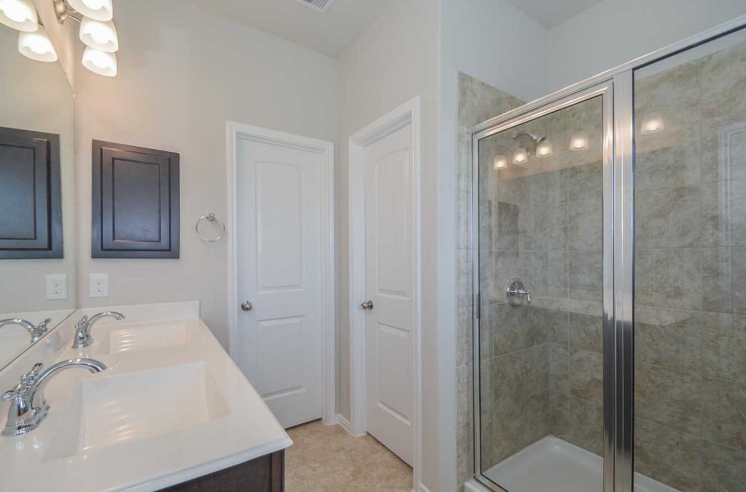 3306 Rainflower Springs Lane Rosenberg, TX 77471 - Photo 15 of 18 a bathroom with a sink and shower
