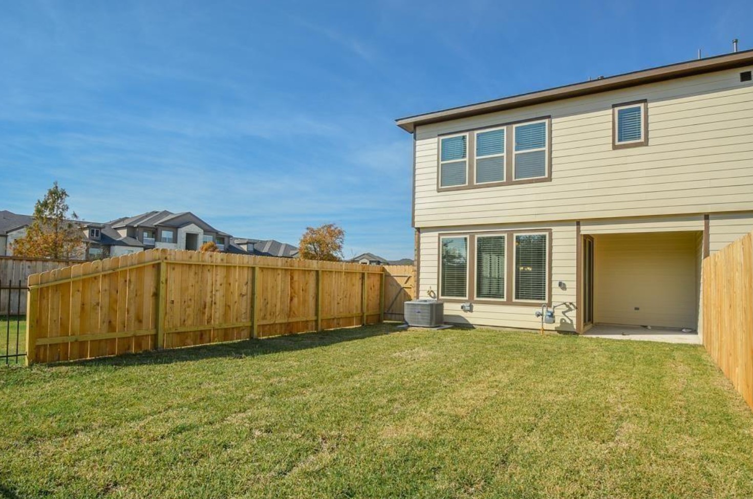 3306 Rainflower Springs Lane Rosenberg, TX 77471 - Photo 17 of 18 a view of a house with a yard