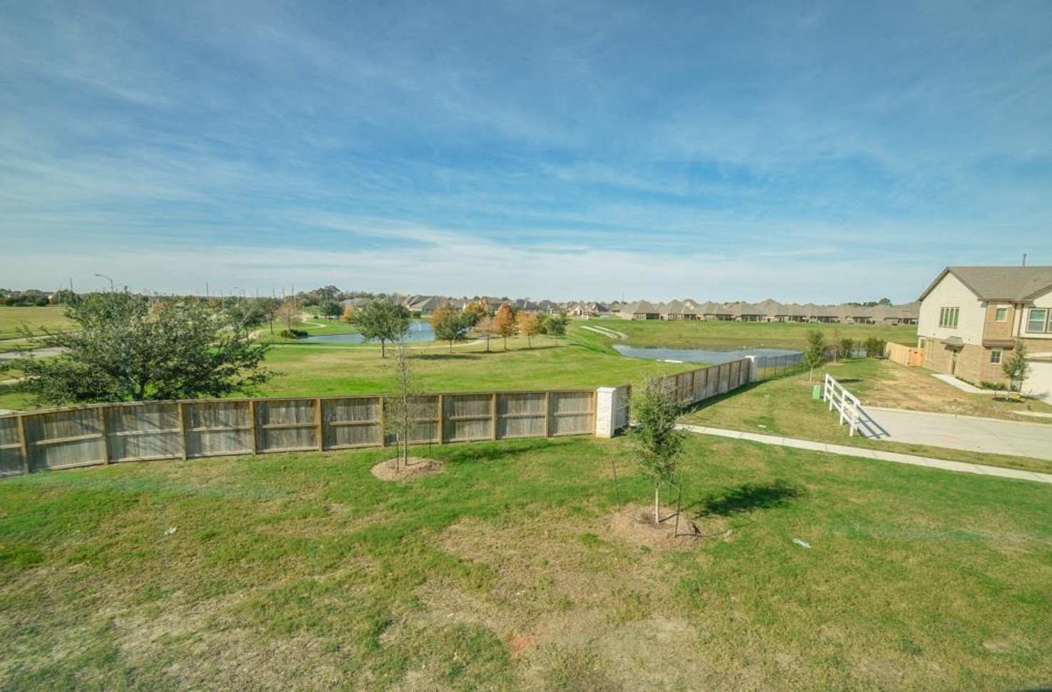 3306 Rainflower Springs Lane Rosenberg, TX 77471 - Photo 18 of 18 a view of house with an outdoor space and seating