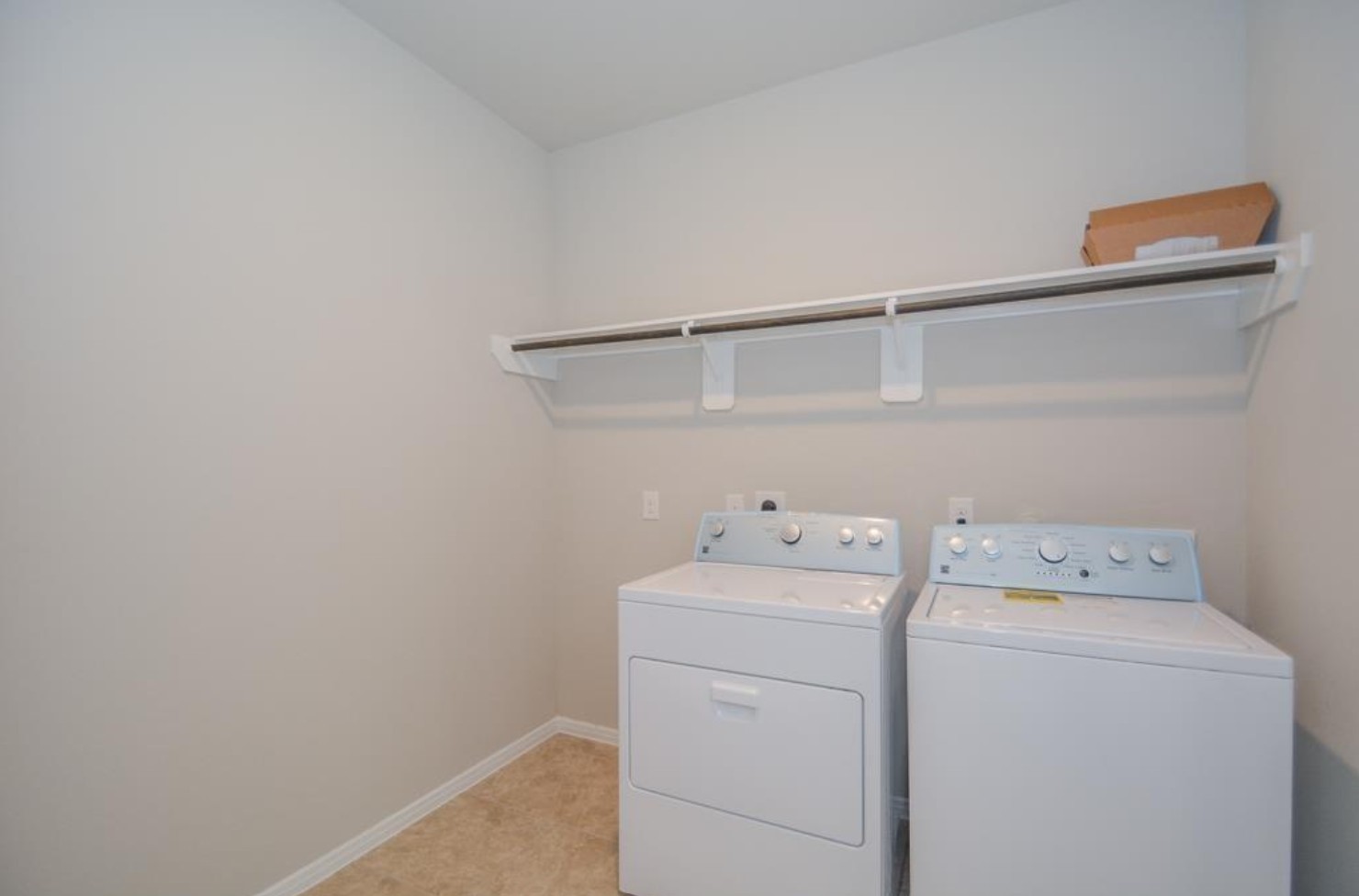 3306 Rainflower Springs Lane Rosenberg, TX 77471 - Photo 10 of 18 a utility room with dryer and washer