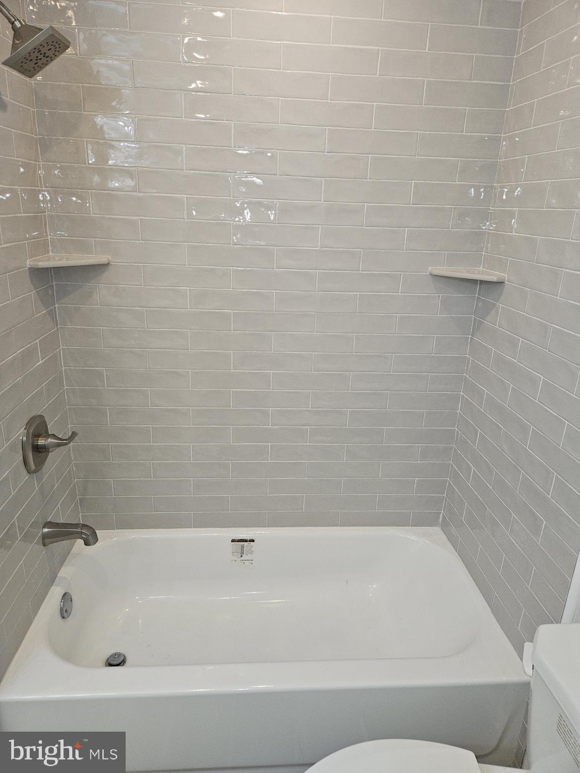 59 High Street, Unit A Philadelphia, PA 19144 - Photo 12 of 26 a bathroom with a bathtub
