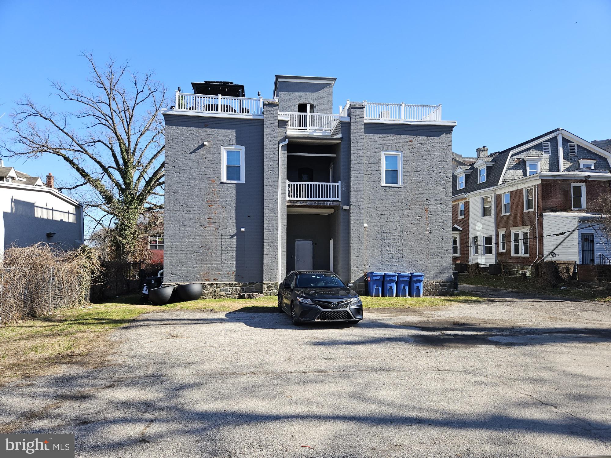 59 High Street, Unit A Philadelphia, PA 19144 - Photo 22 of 26 a front view of a house with a yard
