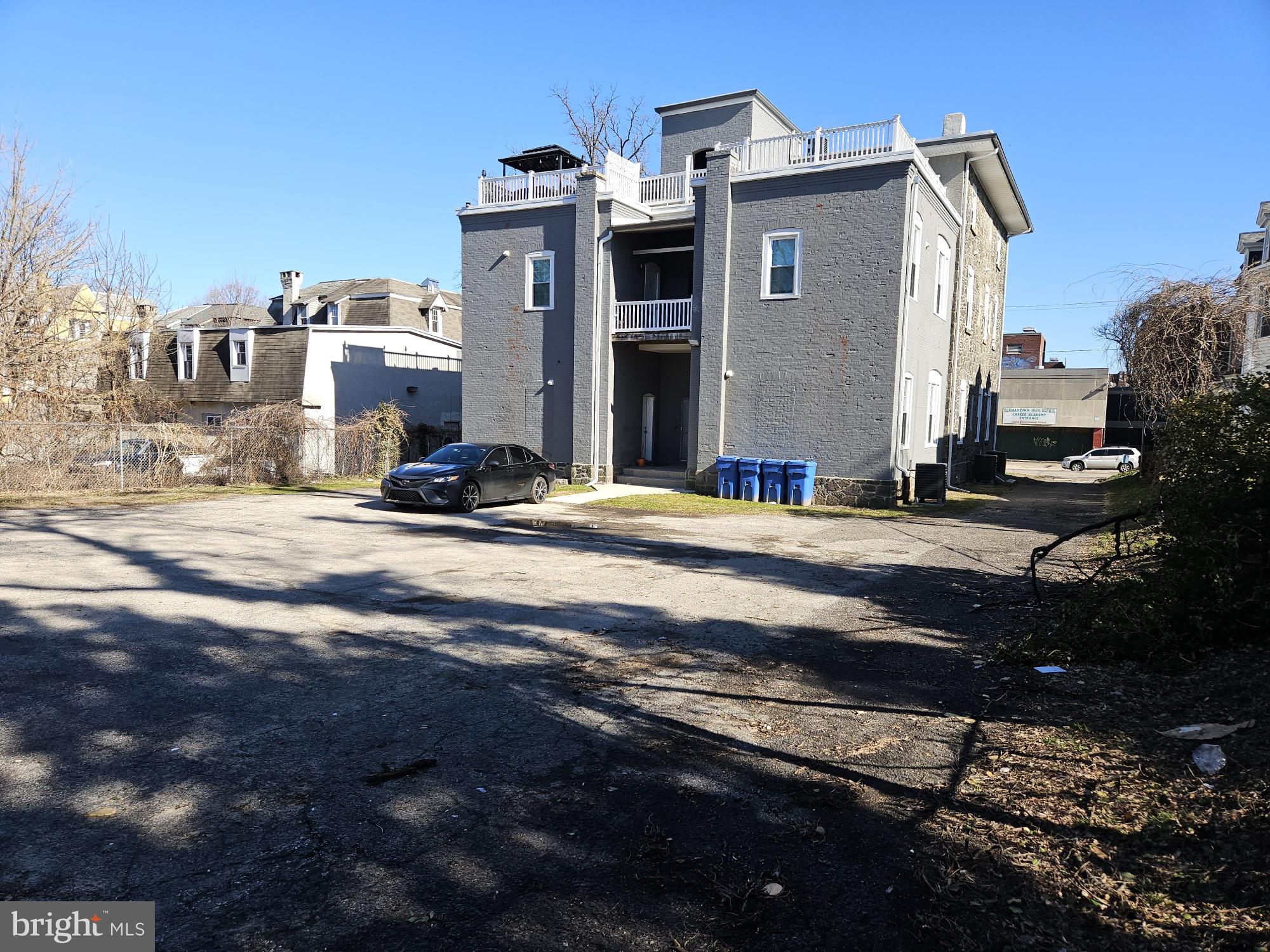 59 High Street, Unit A Philadelphia, PA 19144 - Photo 23 of 26 a view of a house with a yard
