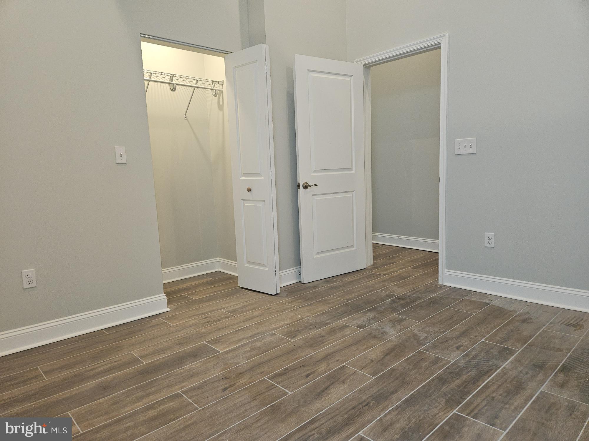 59 High Street, Unit A Philadelphia, PA 19144 - Photo 6 of 26 a view of wooden floor in an empty room