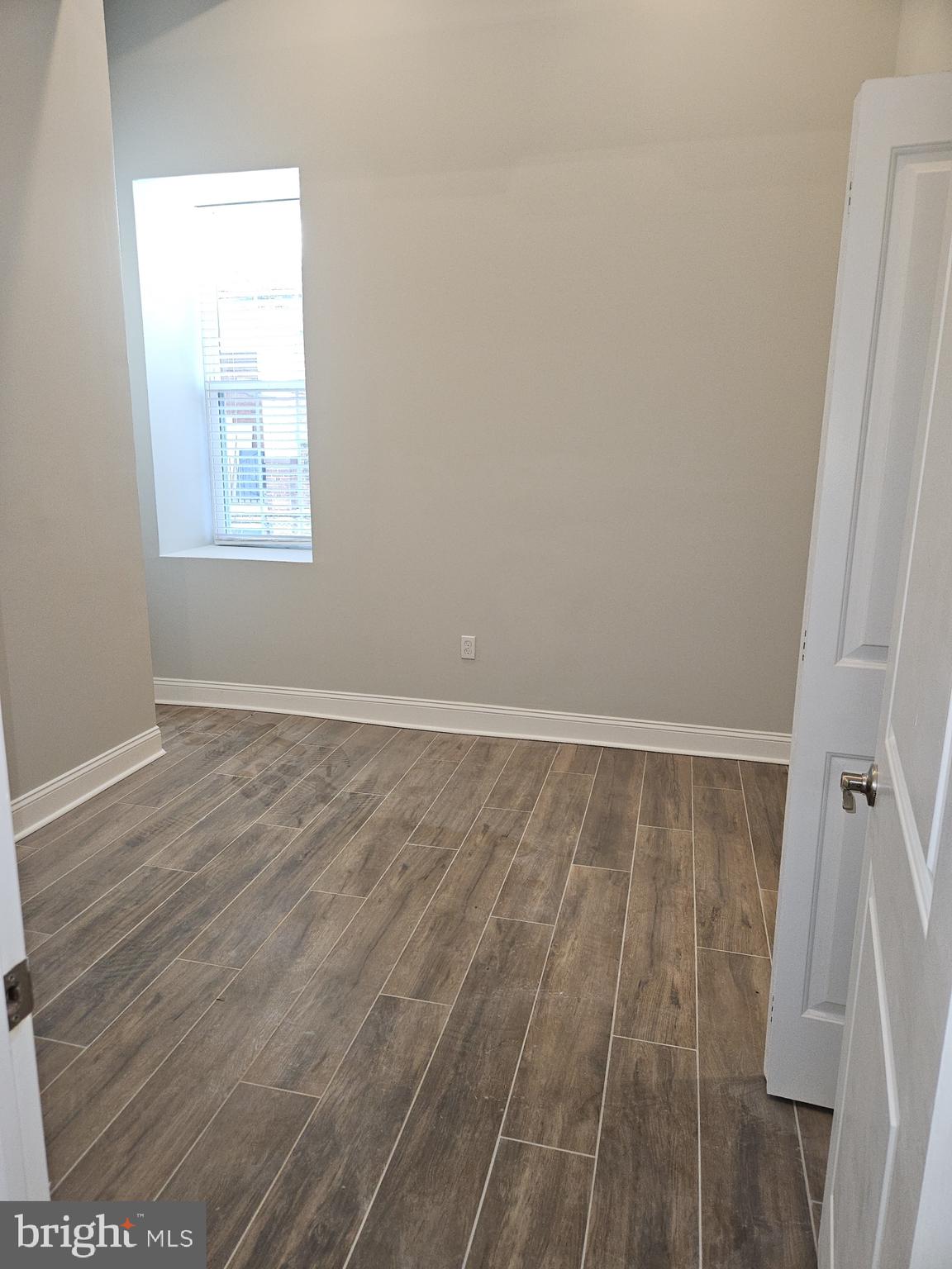 59 High Street, Unit A Philadelphia, PA 19144 - Photo 10 of 26 a view of a room with wooden floor and windows