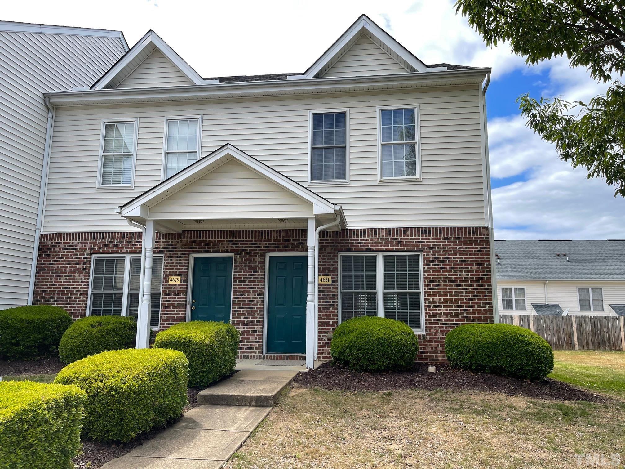 4631 Ravi Road Raleigh, NC 27604 - Photo 2 of 18 a view of a yard in front of a house