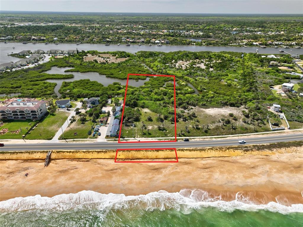 Includes  lot on the Beautiful Sandy Beach!