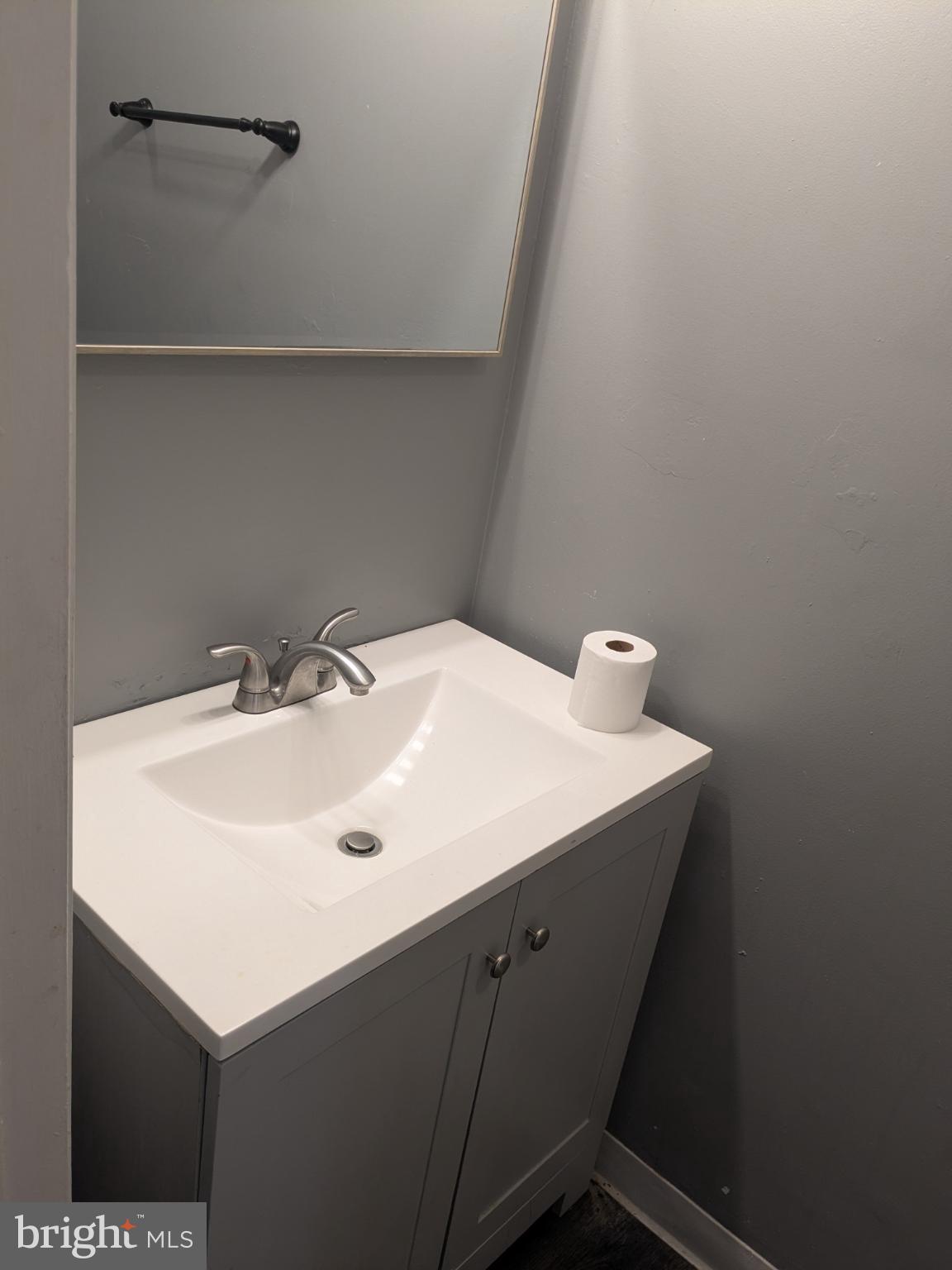 51 Noble Road Sicklerville, NJ 08081 - Photo 11 of 27 a bathroom with a sink and vanity