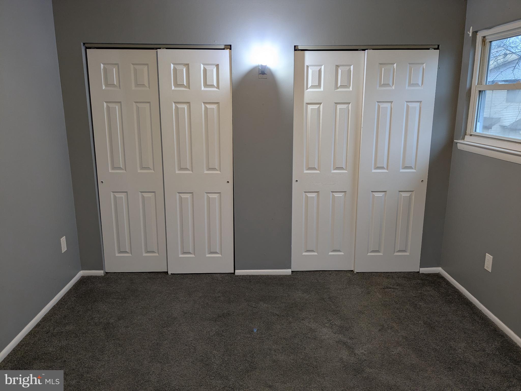 51 Noble Road Sicklerville, NJ 08081 - Photo 15 of 27 an empty room with windows and closet