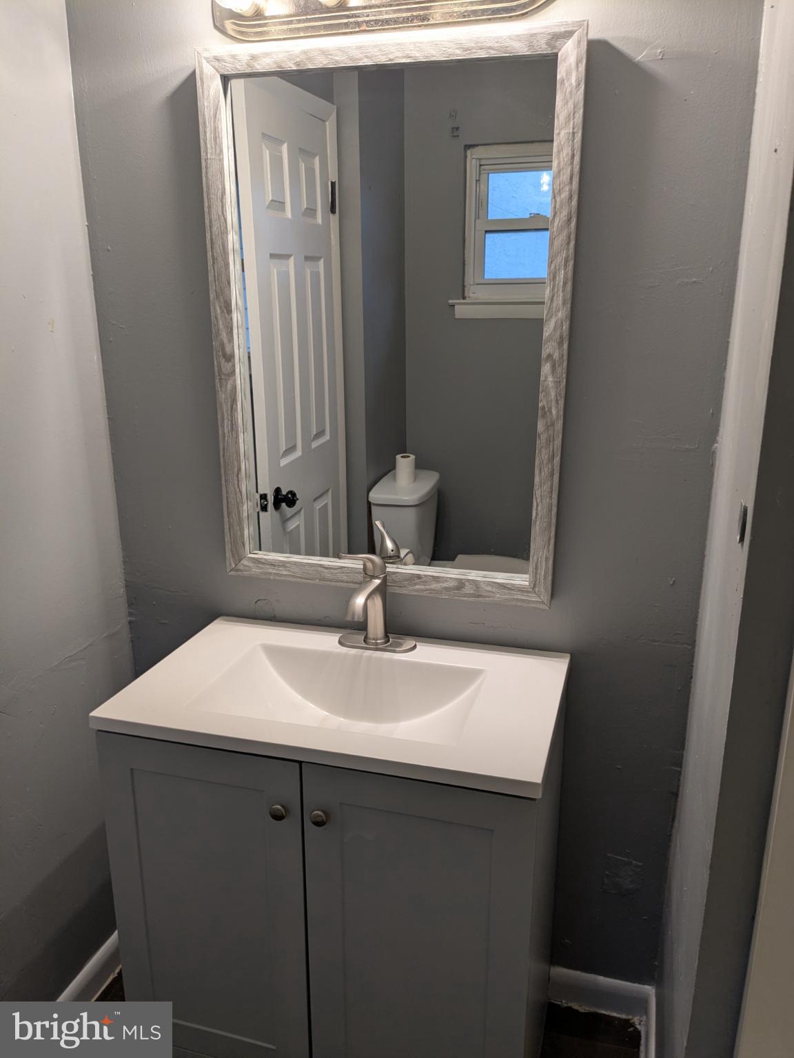 51 Noble Road Sicklerville, NJ 08081 - Photo 22 of 27 a bathroom with a sink and a mirror