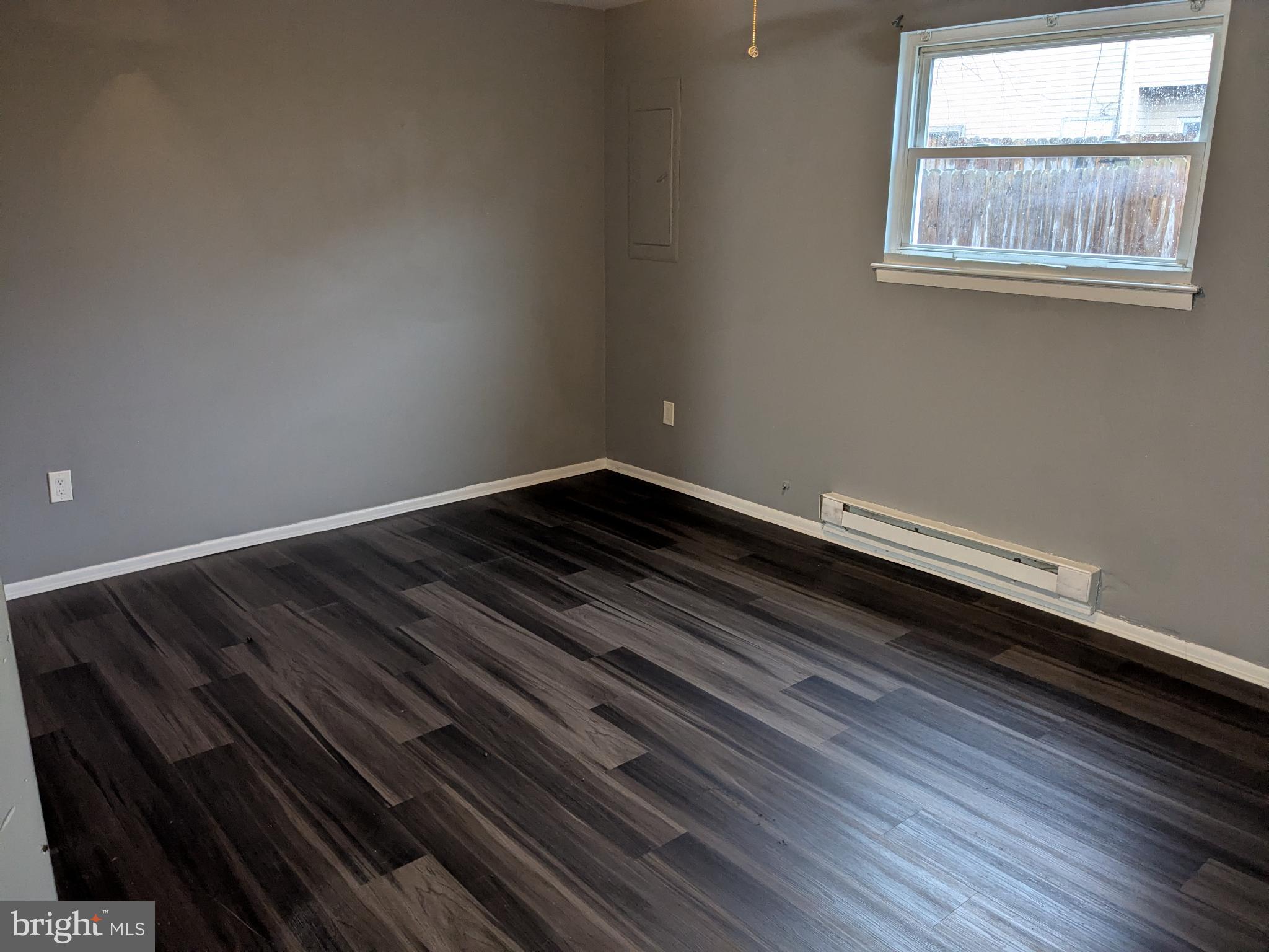 51 Noble Road Sicklerville, NJ 08081 - Photo 8 of 27 a view of room with wooden floor