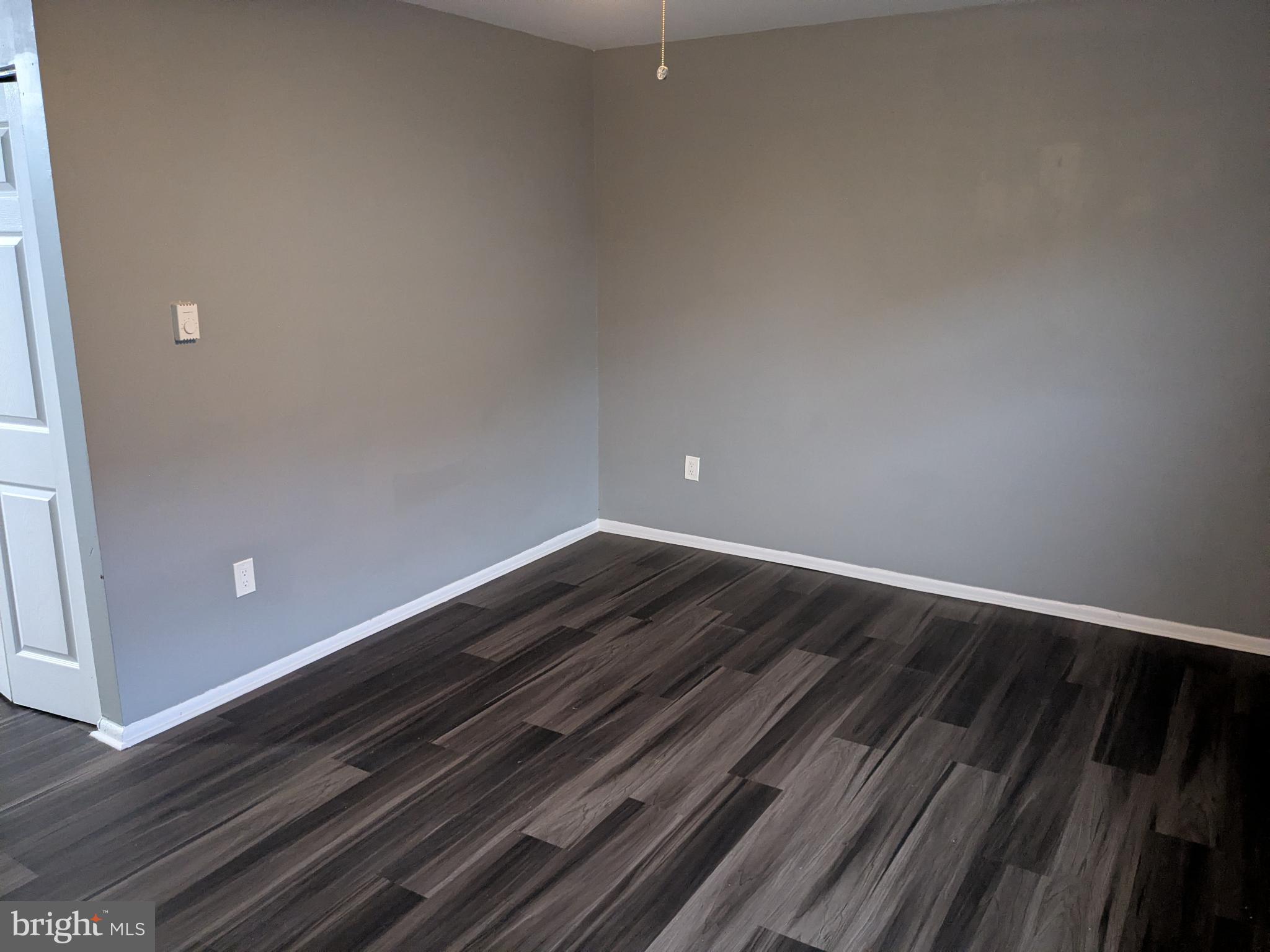 51 Noble Road Sicklerville, NJ 08081 - Photo 9 of 27 a view of room with wooden floor