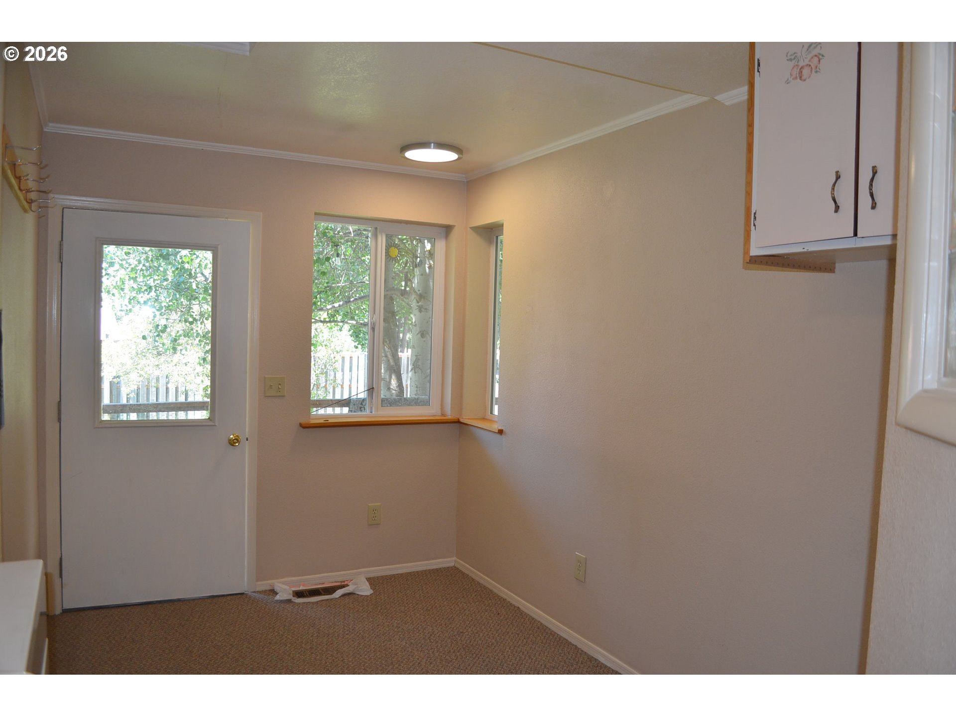 137008 Main Street Crescent, OR 97733 - Photo 17 of 47 a view of an empty room with a window
