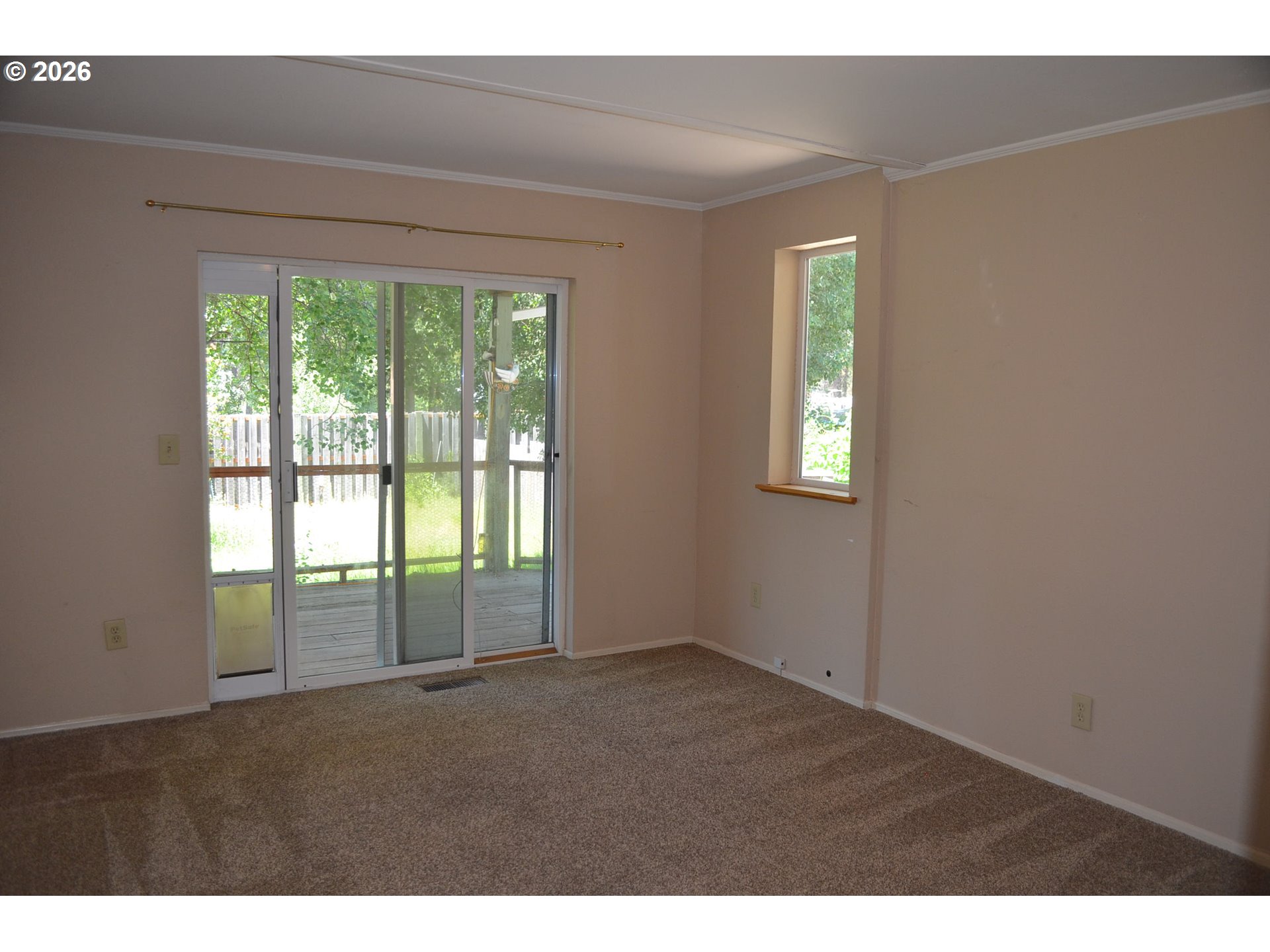 137008 Main Street Crescent, OR 97733 - Photo 25 of 47 a view of an empty room with a window