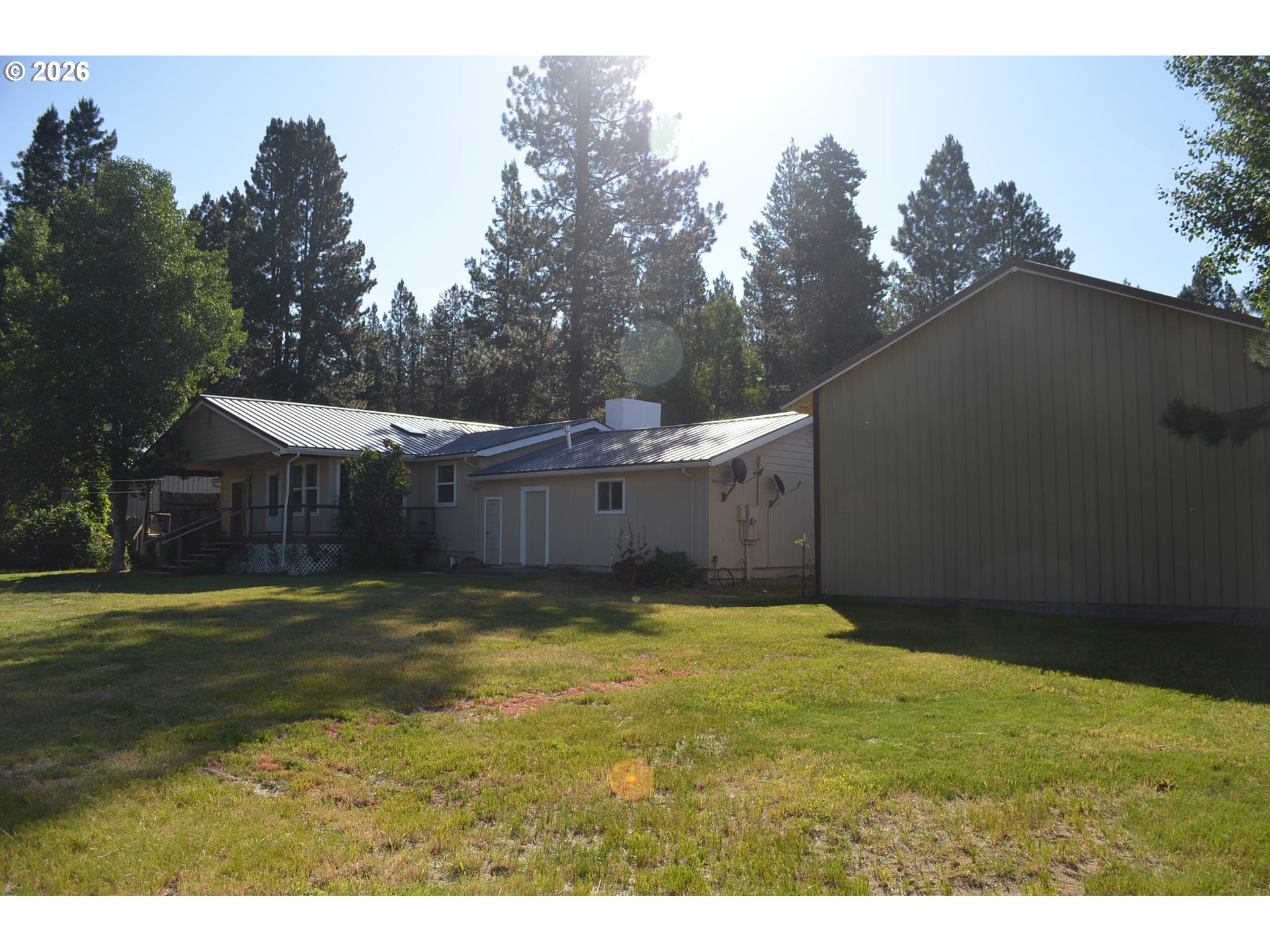 137008 Main Street Crescent, OR 97733 - Photo 36 of 47 a view of a big yard with palm trees