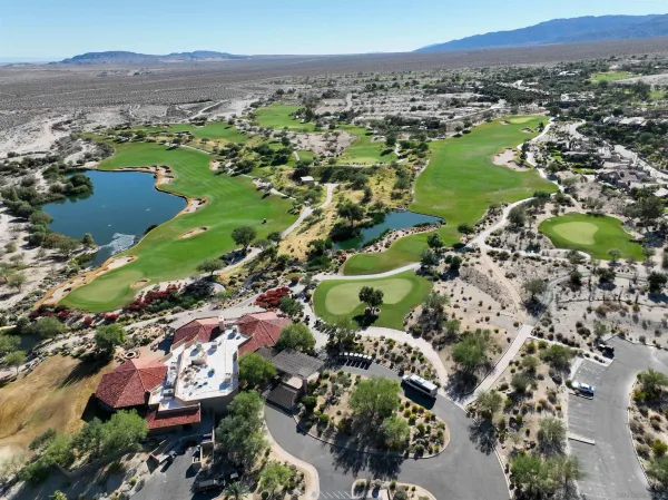 a view of a city with mountains in the background