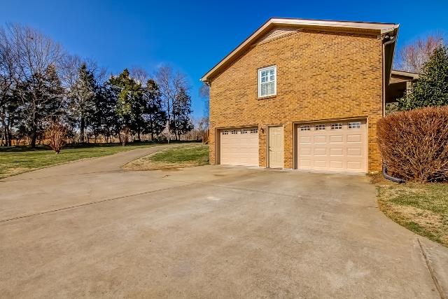 560 Hay Market Road Clarksville, TN 37043 - Photo 20 of 20 Oversized Driveway and Garage with Door