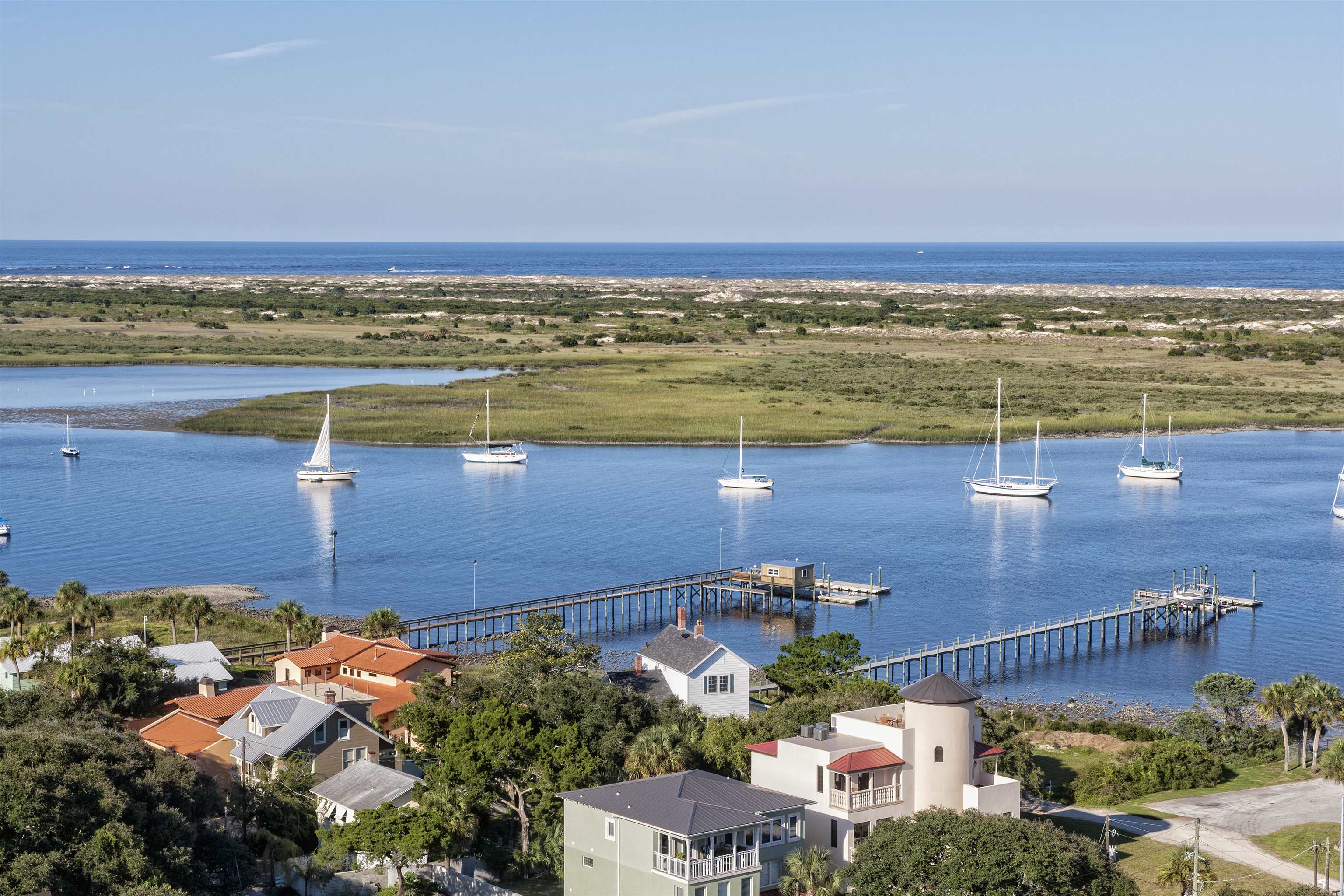 129 16th Street St. Augustine, FL 32080 - Photo 34 of 34 an aerial view of a house with a lake view