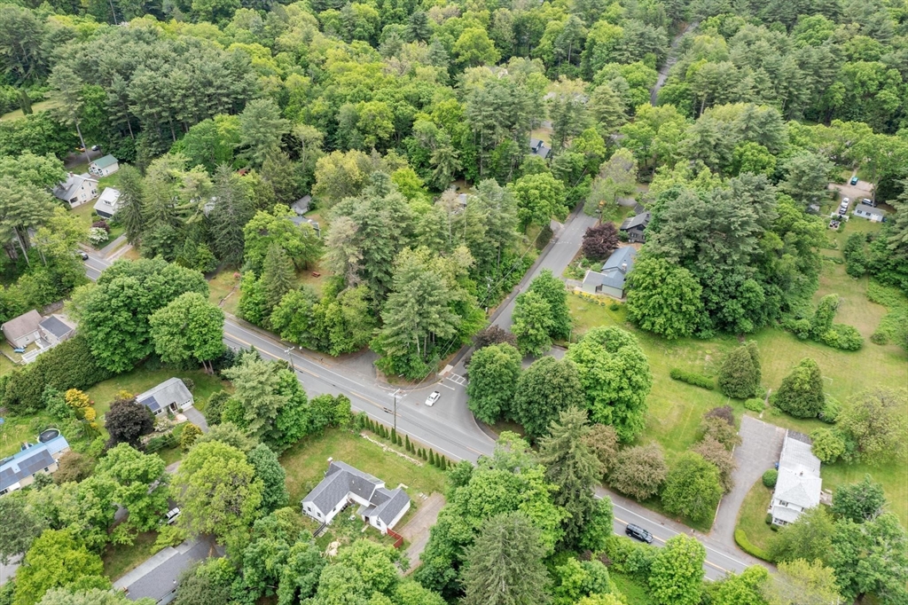0 Heatherstone Road Amherst, MA 01002 - Photo 5 of 9 an aerial view of residential house with outdoor space and trees all around