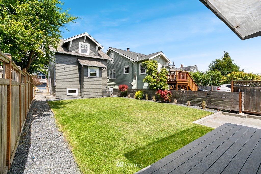 767 North 75th Street Seattle, WA 98103 - Photo 16 of 25 a front view of house with yard