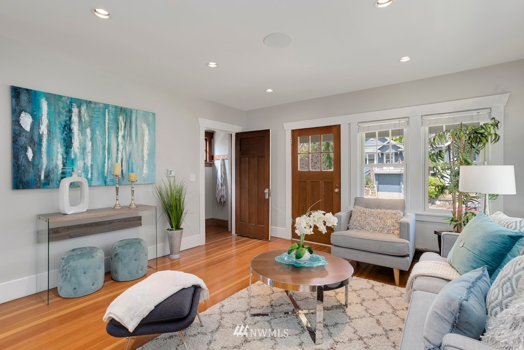 767 North 75th Street Seattle, WA 98103 - Photo 3 of 25 a living room with furniture potted plant and a large window