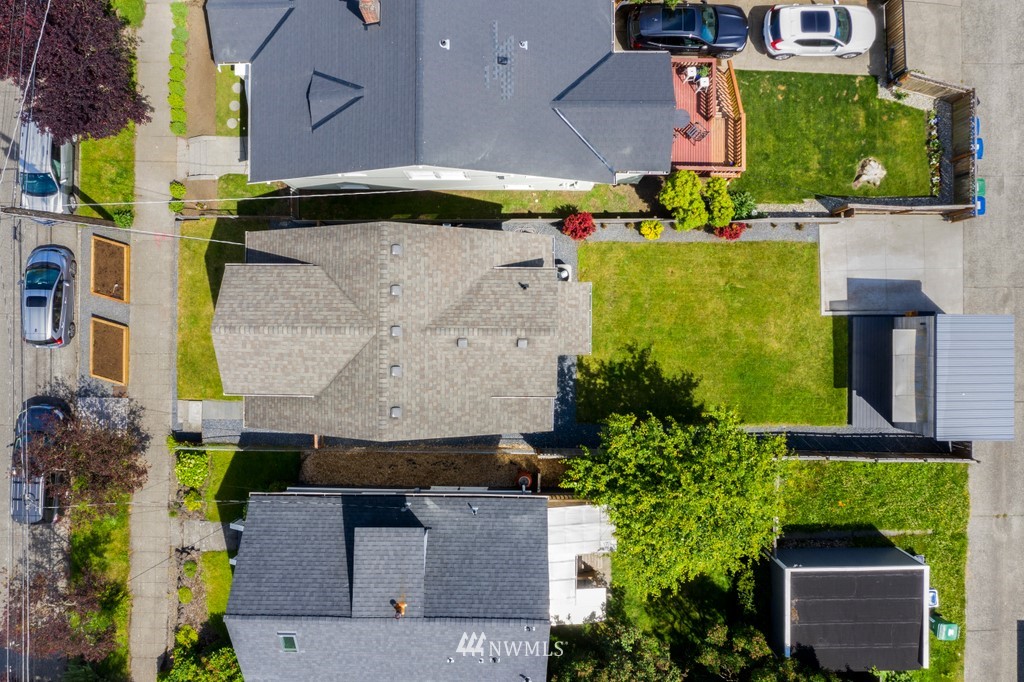 767 North 75th Street Seattle, WA 98103 - Photo 21 of 25 an aerial view of a house with a yard