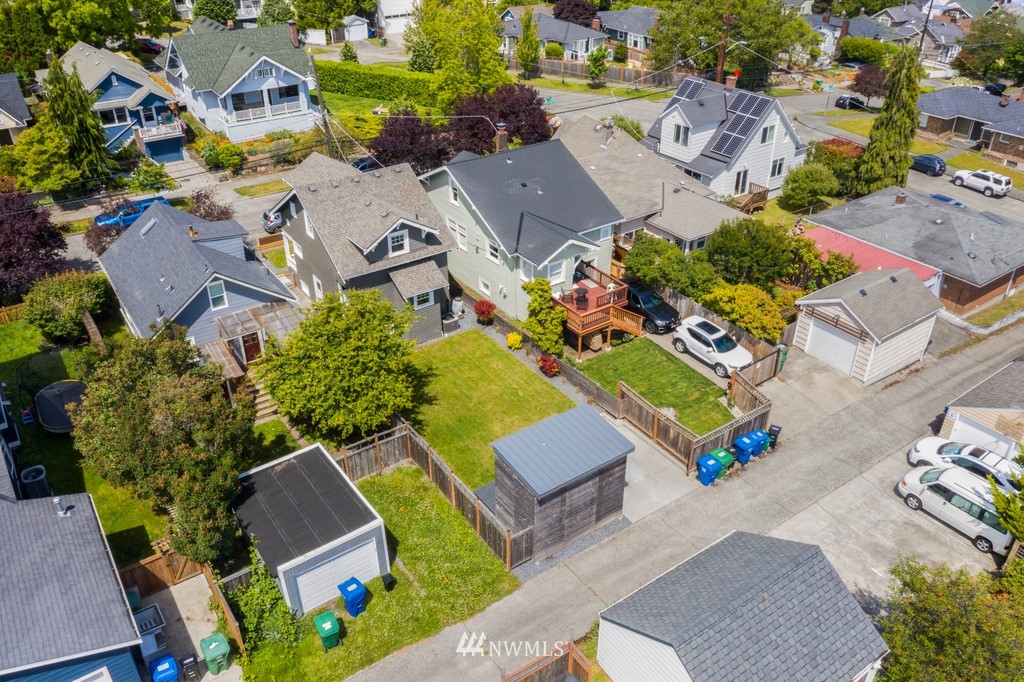 767 North 75th Street Seattle, WA 98103 - Photo 22 of 25 an aerial view of residential houses with outdoor space