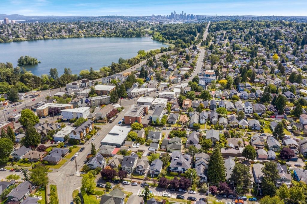 767 North 75th Street Seattle, WA 98103 - Photo 24 of 25 an aerial view of a city with mountains